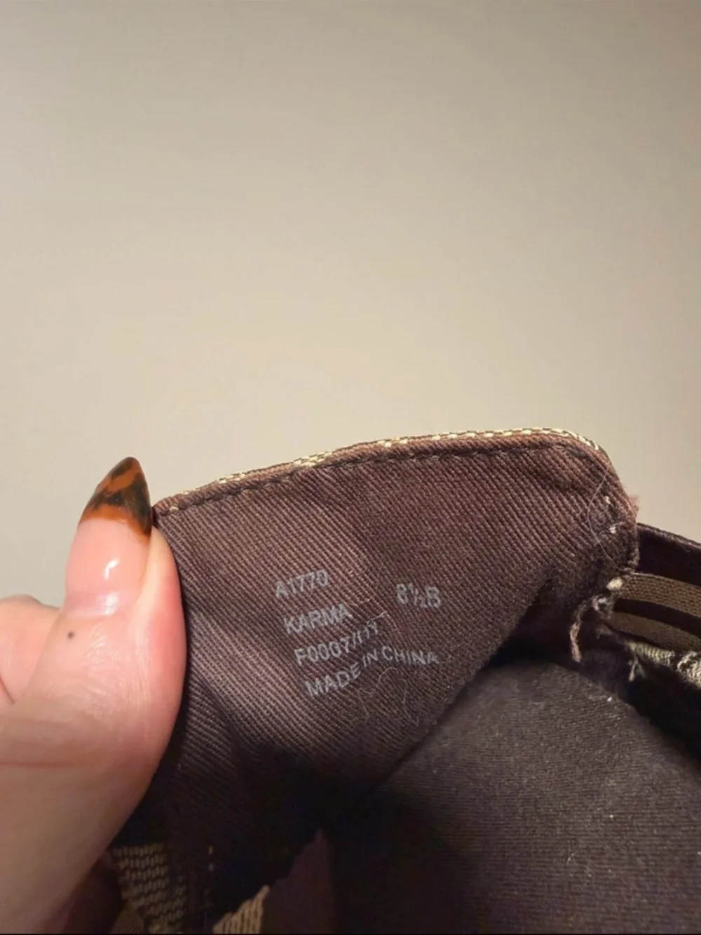 Women’s Coach Slip-On Shoes in Brown and Tan